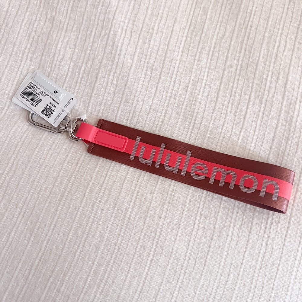 Lululemon wordmark never lost keychain